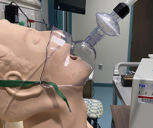 Infectious Aerosol Mask Prevents Viral Spread in Healthcare Setting