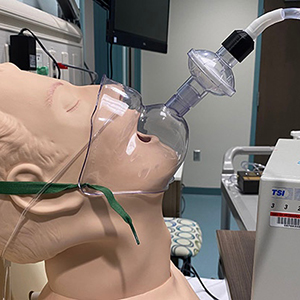 Infectious Aerosol Mask Prevents Viral Spread in Healthcare Setting